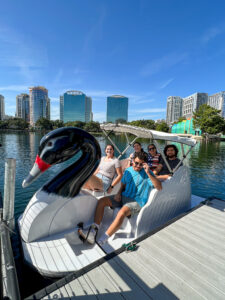 Swan boats at Lake Eola Park, the perfect way to spend 407 Day