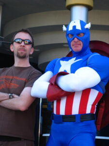 A man poses with Captain America at Universal Orlando Resort, the perfect place to enjoy fireworks and more on Independence Day