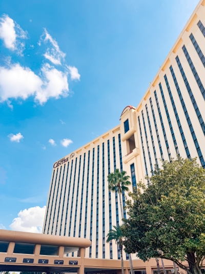 Blue skies surrounding the buildings of Rosen Centre in Orlando, which ranks top among Orlando convention center hotels.