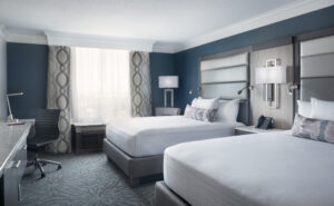 A guestroom at Rosen Centre, the perfect place to get a great night's sleep while traveling. 