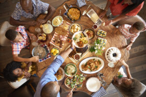 Southern Food in Orlando - Family sitting at a table at Chef Art Smith's Homecomin'