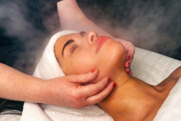 A close-up of a woman's face as she gets a facial at The Spa at Rosen Centre. 