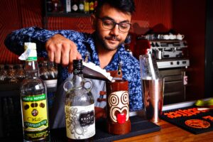 Bartender making a cocktail at a Tiki bar