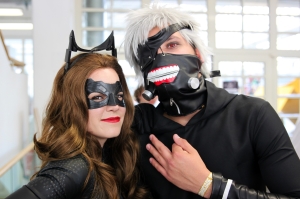 Fans cosplaying as Catwoman and Ken Kaneki