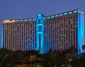 Exterior image of Rosen Centre Hotel at dusk.