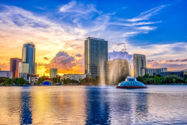 The Orlando skyline over Lake Eola during a beautiful sunset.